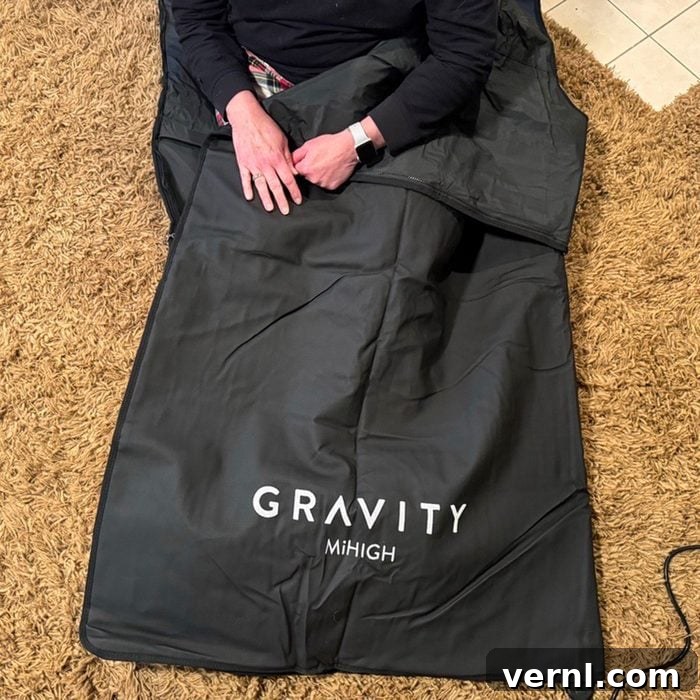 MiHIGH Sauna Blanket We Melted Into a Warm Relaxing Cocoon 5 The MiHIGH Infrared Sauna Blanket in use, demonstrating the ease of setup and personal space it offers.
