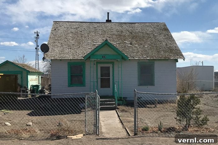 The Unspoken Realities of Buying a Fixer-Upper 4 Front yard of an upper fixer house
