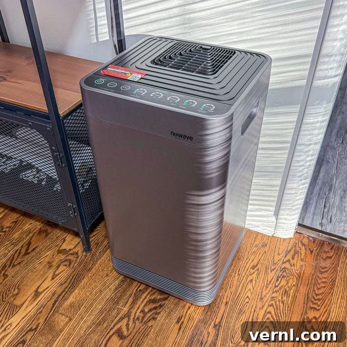 NuWave OxyPure Air Purifier: The End of My Endless Dusting 7 Nuwave Oxypure Air Purifier operating quietly in a brightly lit room, showcasing its clean design.