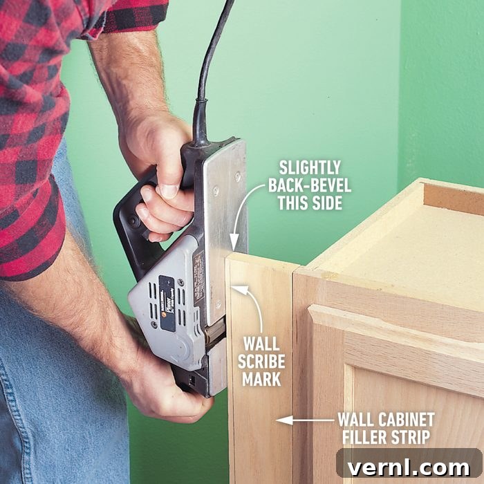 Mastering Your Electric Planer 8 Electric planer used to taper-cut filler boards for tight-fitting cabinets against walls