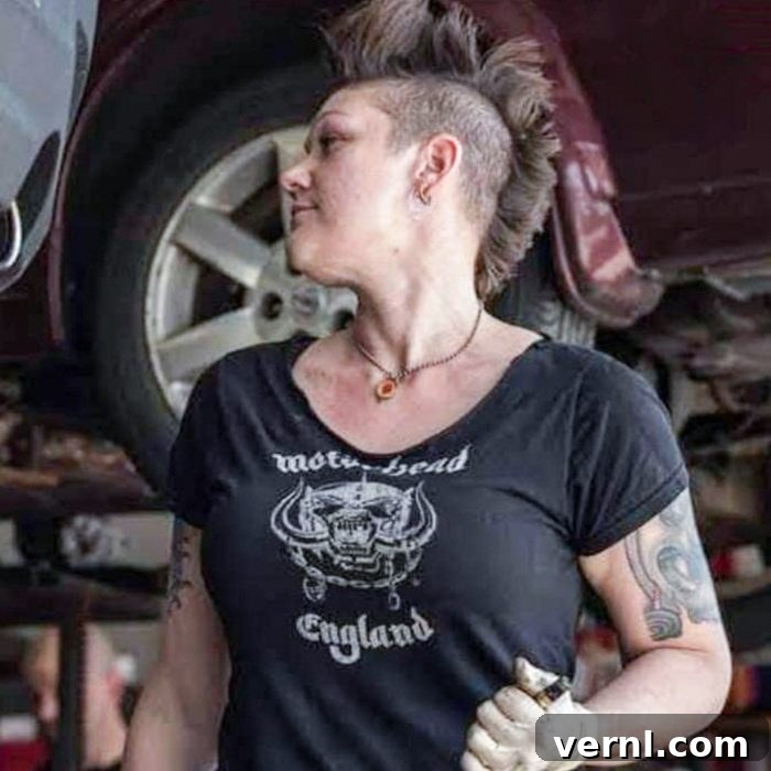 Valerie Adams: The Engine of Change 3 Portrait of car mechanic