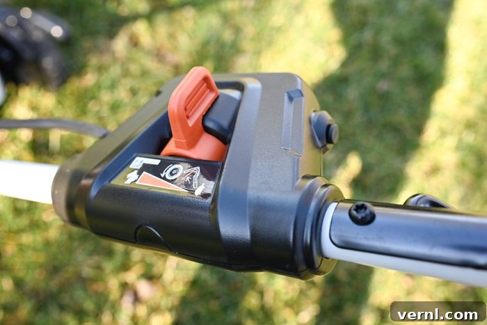 Stihl Electric Mower Unplugged Performance Review 7 A closeup of a switch on a lawn mower