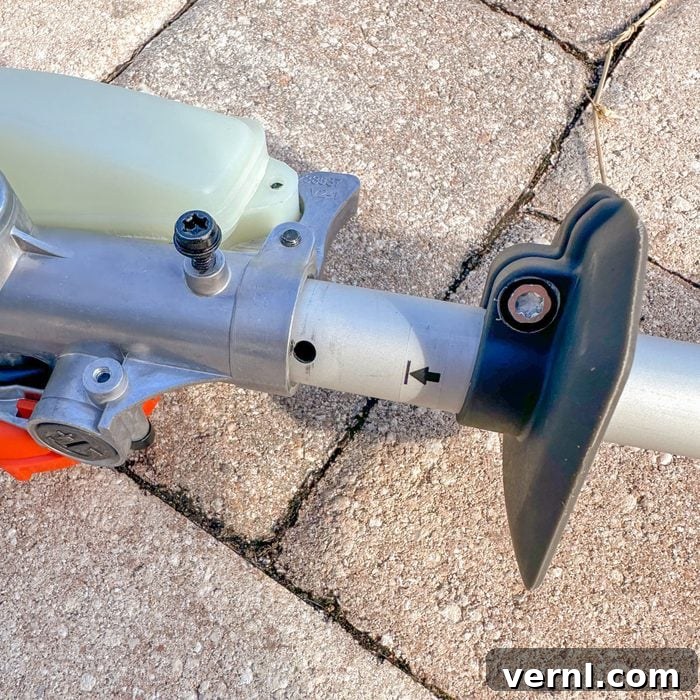 Husqvarna Combi Switch 330iK Review: Why I Fired My String Trimmer and Chainsaw 3 Husqvarna 330i Combi Features Screw
