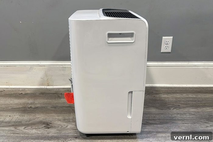 My Frigidaire Dehumidifier Review Conquering Basement Humidity 6 Frigidaire Dehumidifier side view, demonstrating its presence in a real home setting