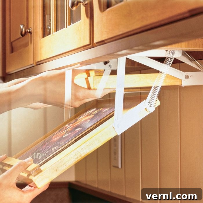 Innovative swing-down hinges for a cookbook rack to save counter space