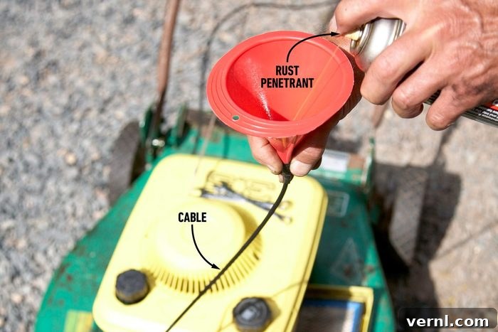 Quick Fix for a Jammed Mower Throttle Cable 2 A person is holding a red funnel and a can, likely adding oil or fuel to the yellow engine of a green lawnmower. The lawnmower is on a gravel surface.