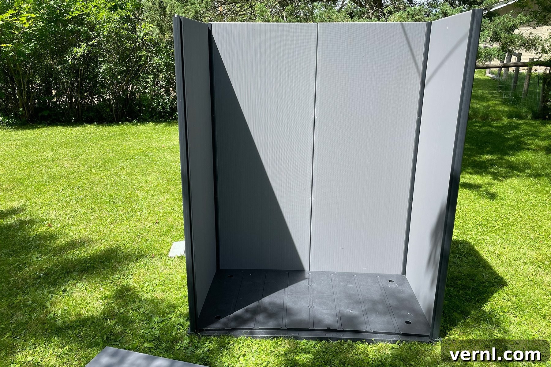 Keter Storage Shed Review: Smart Storage for Small Outdoor Spaces 4 Keter Shed with just walls on grass