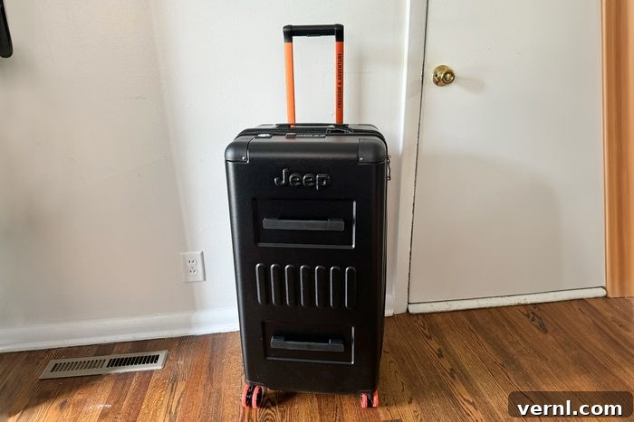 Delsey Paris and Jeep Unveil New Outdoor Luggage: Our Honest Review 3 Fhma24 Delsey Paris X Jeep Large Spinner Trunk Mary Henn 03 Ssedit