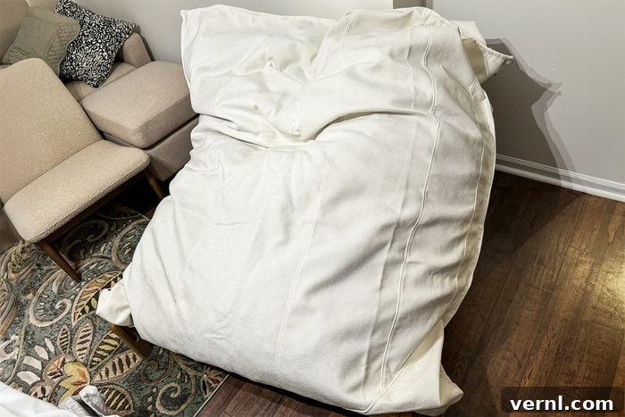 My Honest Review of the New Lovesac PillowSac Accent Chair 3 Lovesac Pillowsac on wooden floor
