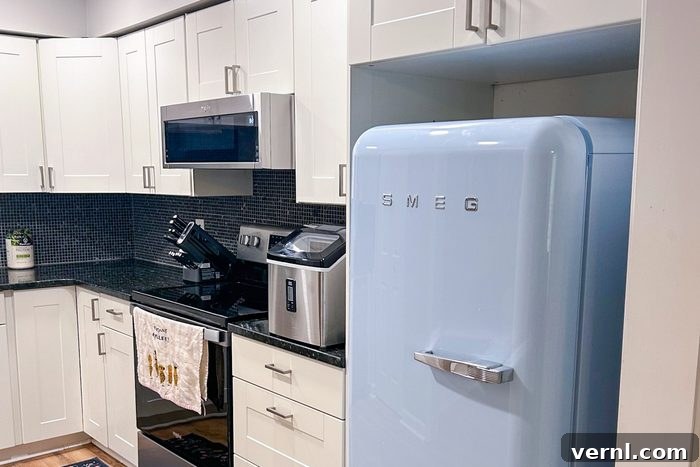 Smeg Fridge Review: Is the Style Just Skin Deep? 3 Smeg Fab 28 Fridge under the kitchen cabinet.