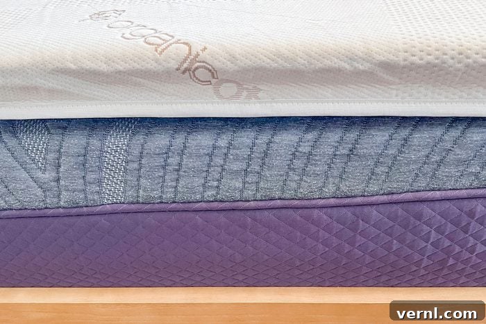 Saatva Graphite Memory Foam Mattress Topper: Instant Sleep Upgrade 6 Saatva Graphite Memory Foam Mattress Topper side view.