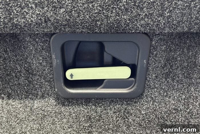 Unlocking the Secret: Why Cars Have a Glow-in-the-Dark Trunk Release 2 Close up of an Emergency Trunk Release latch
