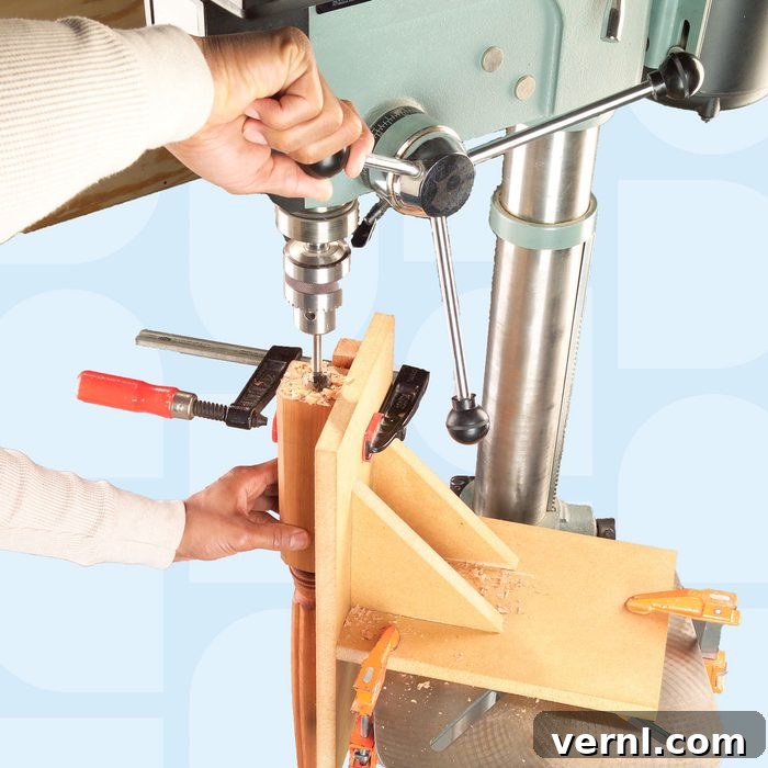 Vertical drilling jig for centered deep holes in board ends