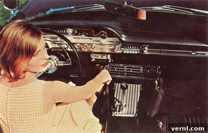 The Demise of the Manual Transmission 3 High angle view of woman Inside '50s Car holding the gear shift