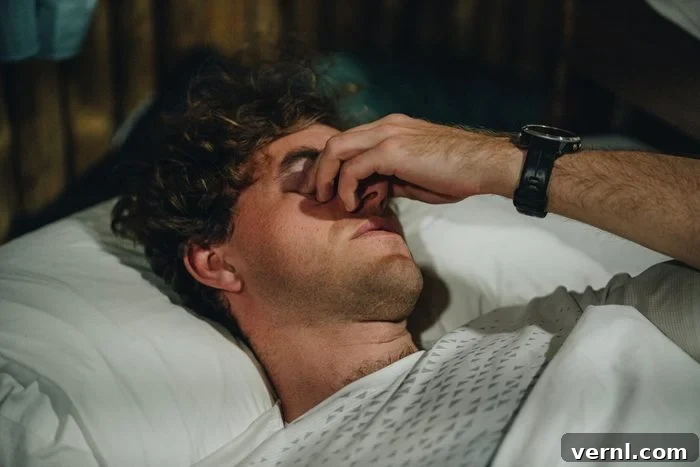 Daylight Saving Time: Why We Should and Shouldn't Stop Changing Clocks 2 Portrait of young man groggily waking up in the morning