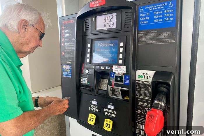 Unlocking Costco's Fuel Pricing Secret 2 Mature adult man filling tank at gas pump