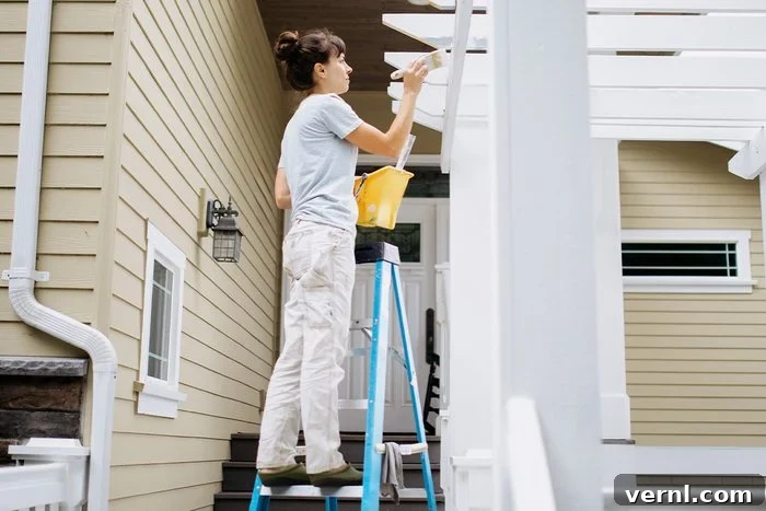 Don't Sweat Your Summer DIY Essential Cooling Tools 3 Man wearing breathable long pants while doing home maintenance work in the heat to stay cool