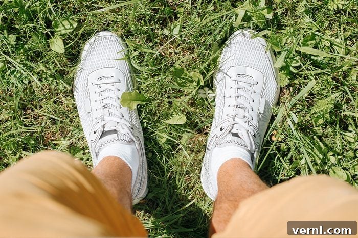 Don't Sweat Your Summer DIY Essential Cooling Tools 5 Man wearing breathable mesh steel-toe shoes while doing home maintenance to stay cool