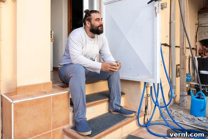 Don't Sweat Your Summer DIY Essential Cooling Tools 9 Man taking a frequent break in the shade while doing home maintenance work in the heat to stay cool