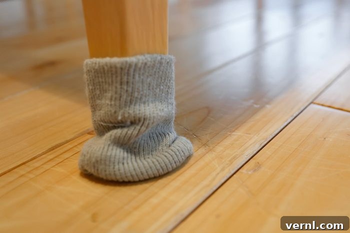 furniture leg covered with cloth to avoid scratching floor