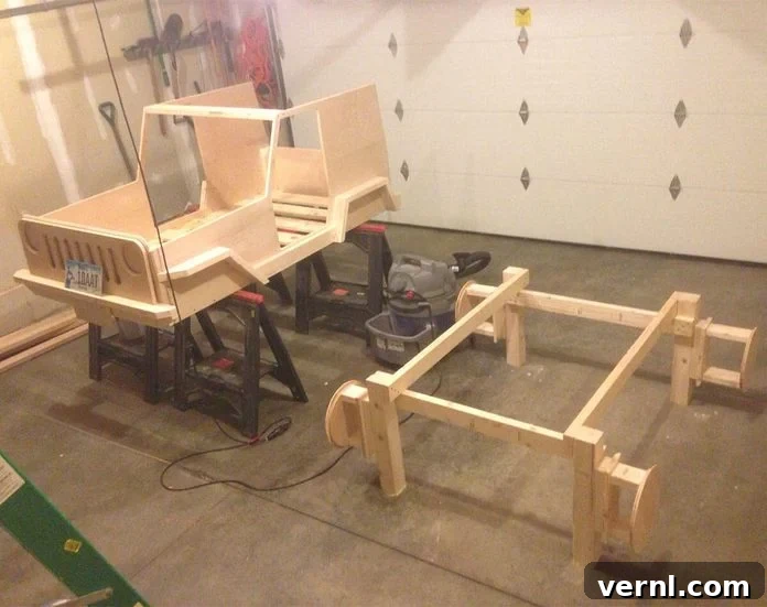 Progress shot of a Jeep bed being built, showing the wooden frame and early construction