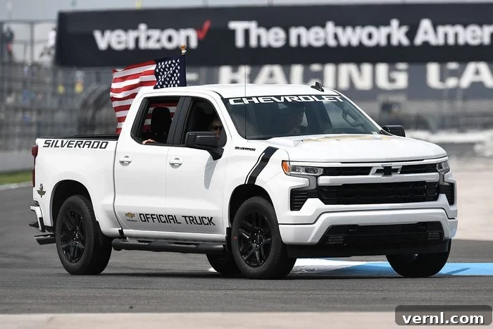 Top Cars of 2025: A Year of Triumphs 3 A Chevrolet Silverado pace truck drives through turn seven on a parade lap