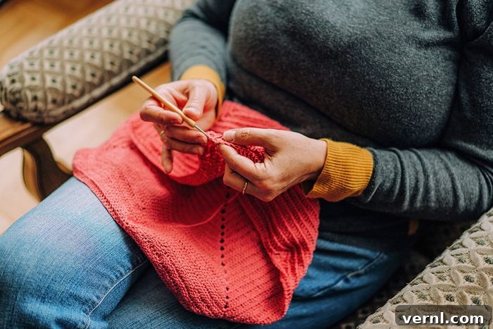 Phil Saw His Shadow: How to Beat the Winter Blues 3 Close-up of hands doing crochet with pink wool