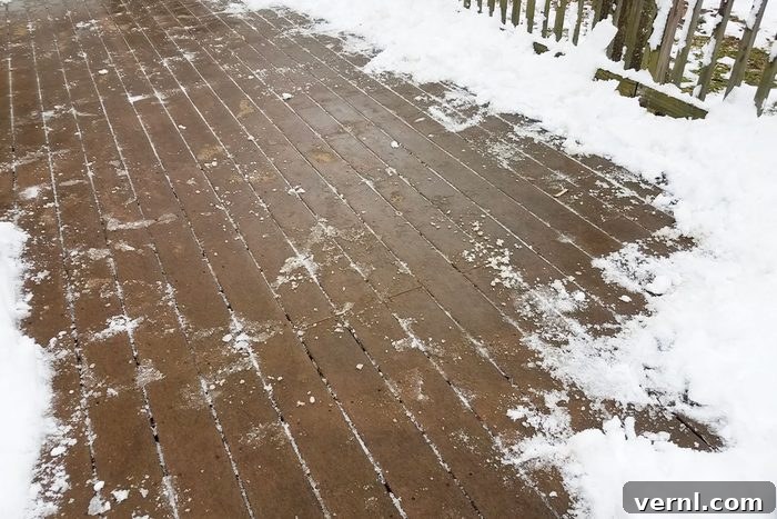 Safeguarding Your Deck: Effective Snow Removal Techniques 2 Snow covered deck