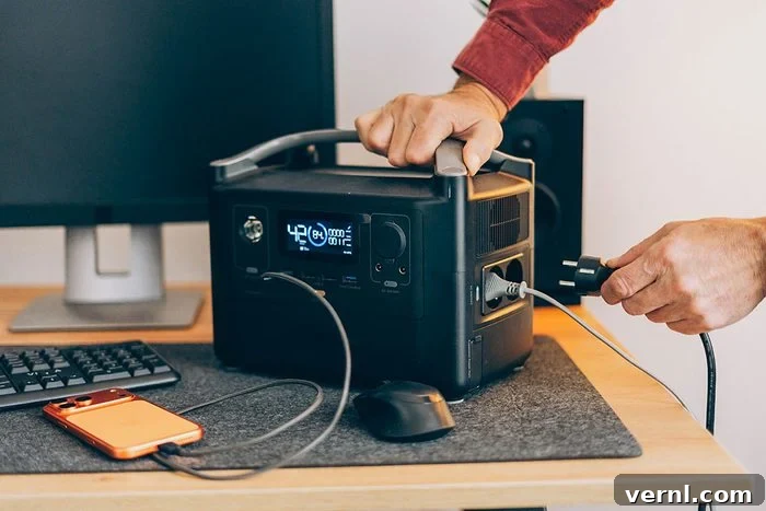 Freelancer using charging station at home during blackout