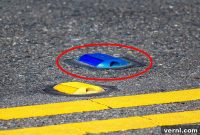 The Hidden Message of Blue Road Reflectors