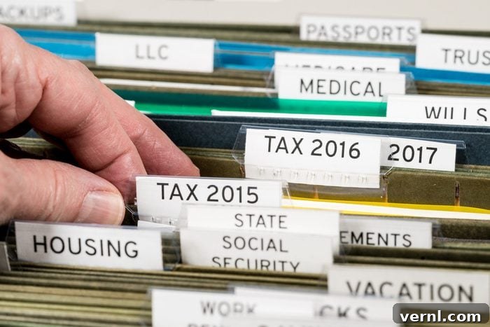 Home filing system for taxes organized in folders