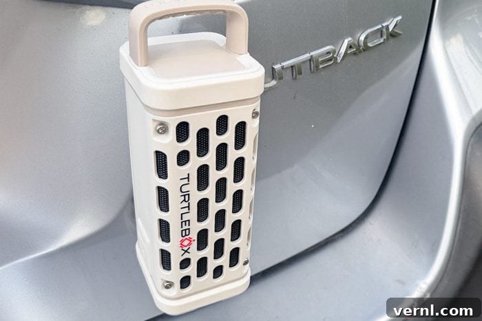 The Unbreakable Sound: Our Deep Dive into the Turtlebox Speaker 7 close up of Turtlebox Ranger stuck with magnetic mounts behind a car