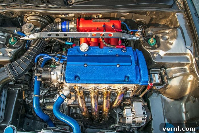 The Truth Behind Your Car's Ticking Noises As It Cools Down 2 Open hood on diesel engine modern car in detail