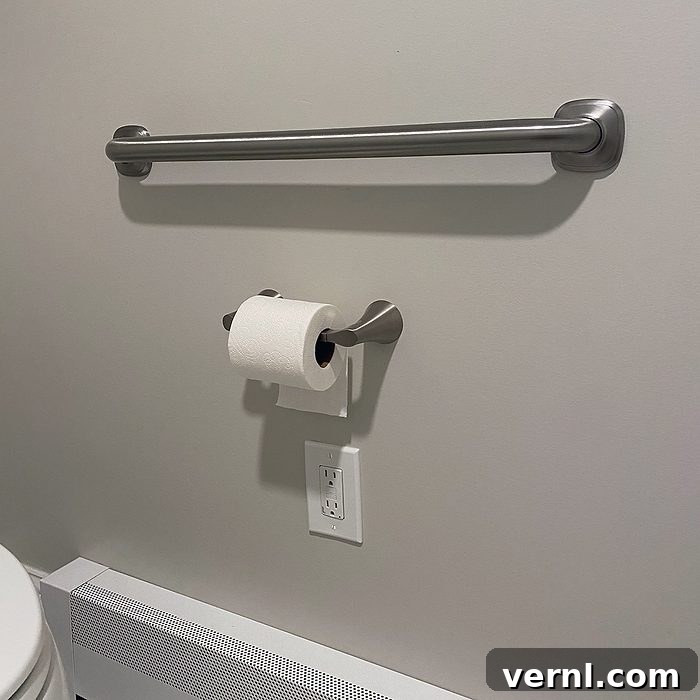 Why I Stopped Renovating for Style and Focused on Function 4 Grab bar on bathroom wall