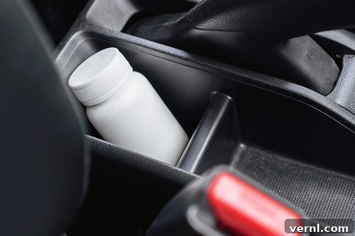 Closeup of Medicine Bottle Inside a Car , using medication before driving concept