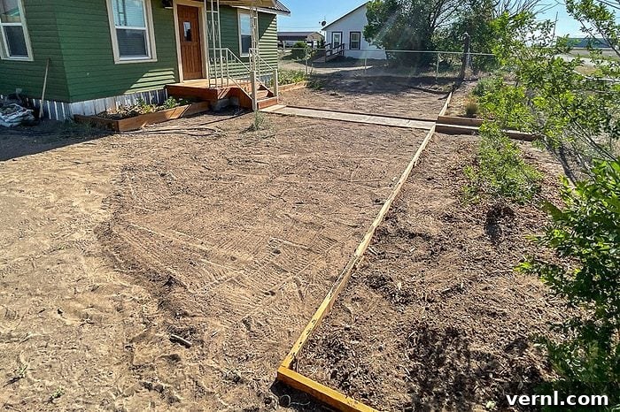 What Happened When I Replaced My Lawn With a Wildflower Meadow 8 hand-tilled soil in the front yard of a house