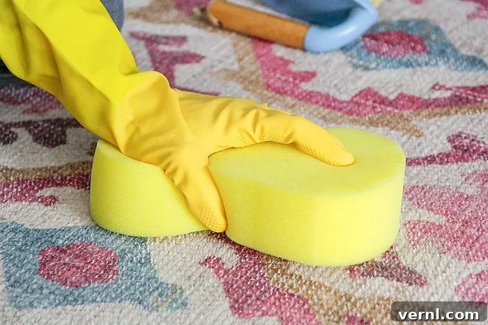 A closeup of a hand clenaing a carpet