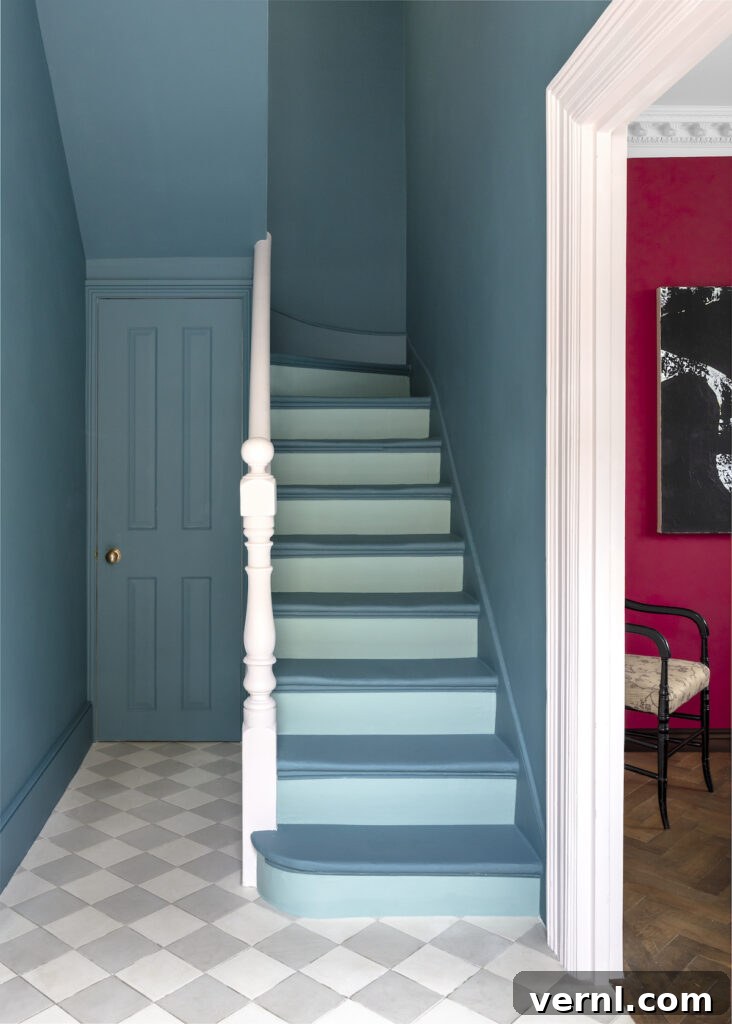 Hallway, Staircase and Landing Design Ideas for an Elegant Home 3 Hallway with a bold blue staircase and contrasting red wall, ideal for those seeking stylish hallway, stairs and landing ideas with a modern twist.