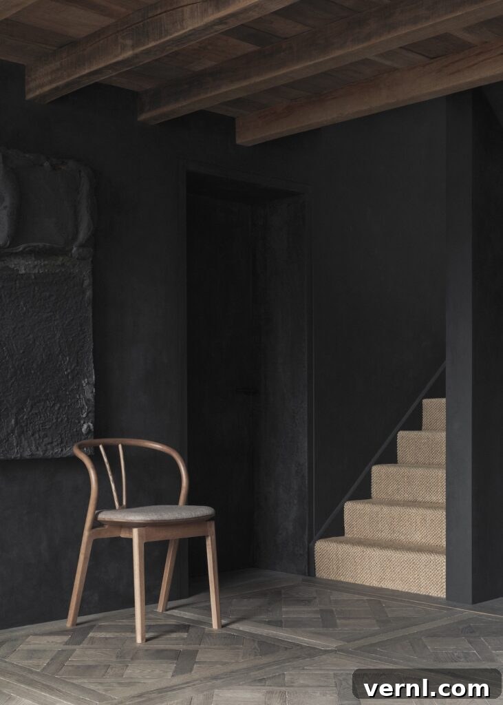 Hallway, Staircase and Landing Design Ideas for an Elegant Home 4 L. Ercolani flow chair in a beamed hallway