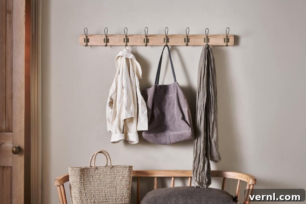 Hallway, Staircase and Landing Design Ideas for an Elegant Home 5 Wooden coat hooks.