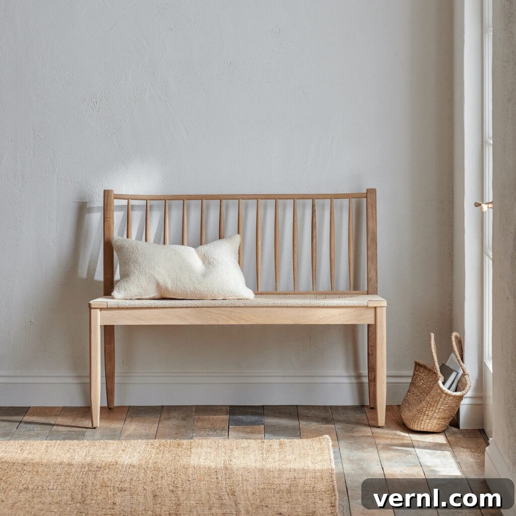 Hallway, Staircase and Landing Design Ideas for an Elegant Home 6 High back wooden bench in a light modern hallway.