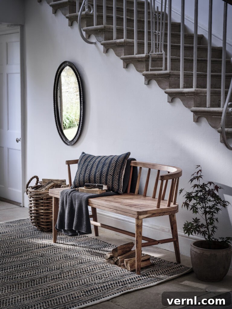 Hallway, Staircase and Landing Design Ideas for an Elegant Home 9 An elegant hallway with a wooden bench.