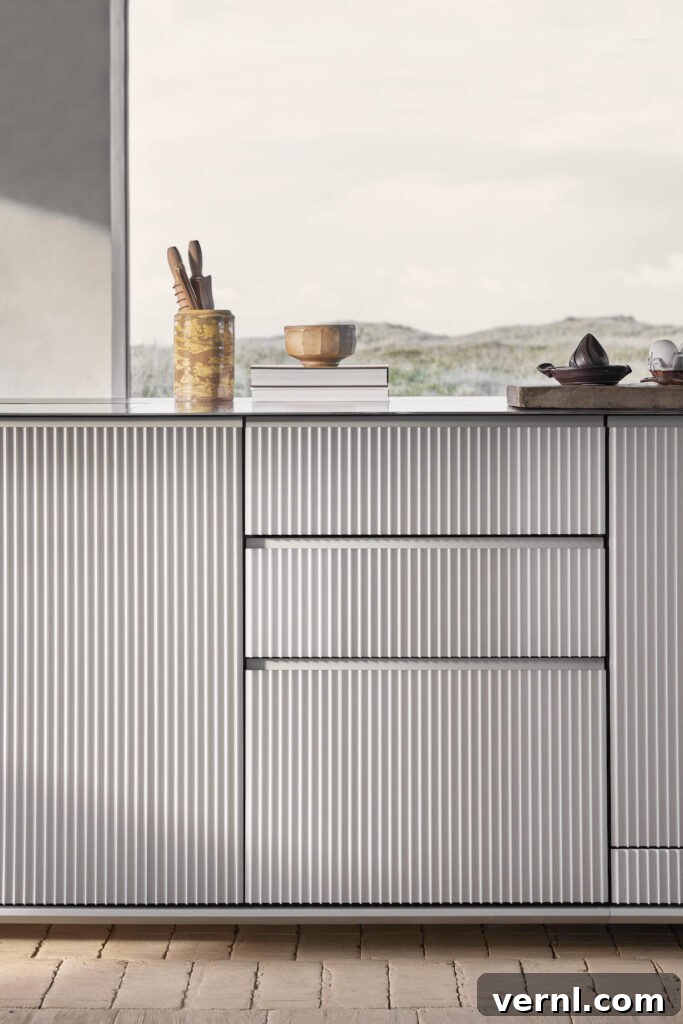 Explore Vipp’s New Coastal Retreat 6 Fluted ribbed kitchen cabinets