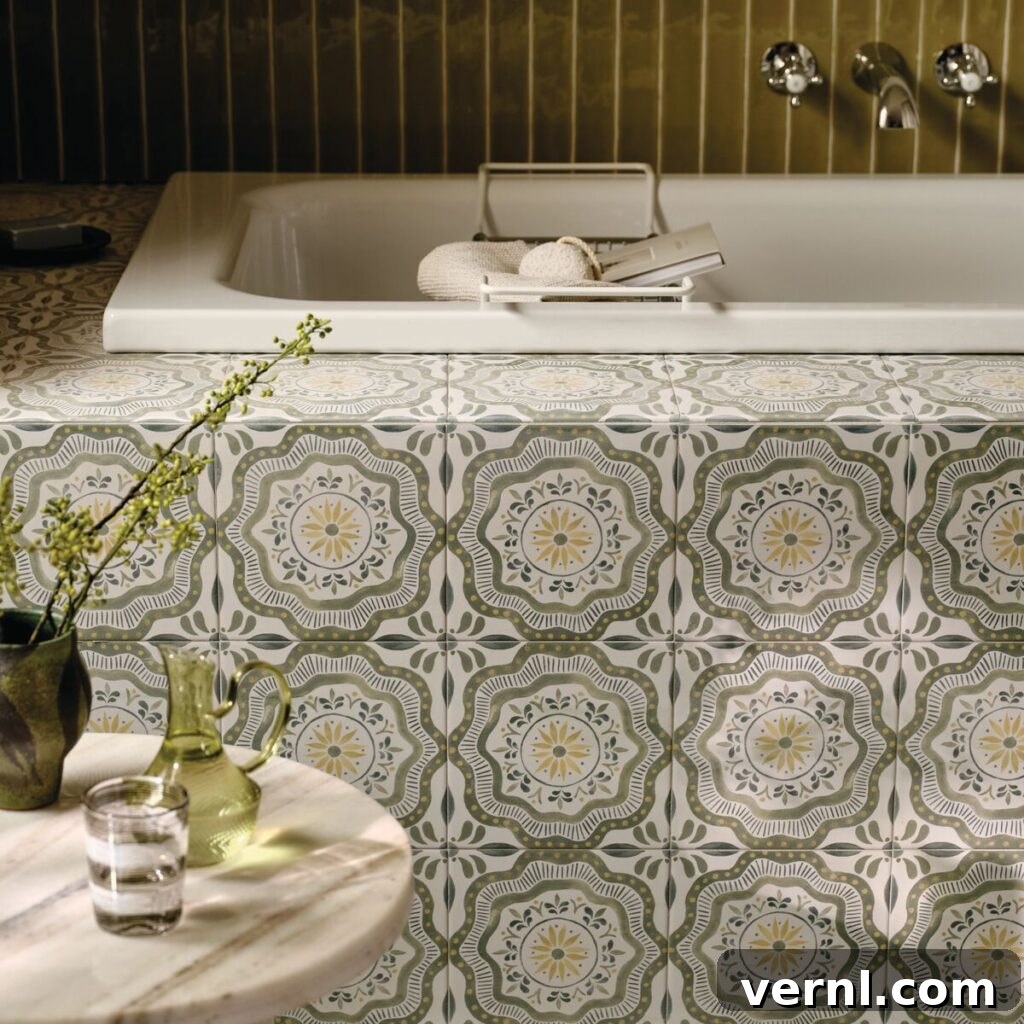 A close up of a bathroom tiled in Cochin Green tiles by Nina Campbell for Fired Earth.