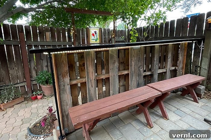How a DIY Couple Built a Backyard Bar for Almost Nothing 4 Fhmd26 Pallet Bar Rebecca Wright 08 Ssedit