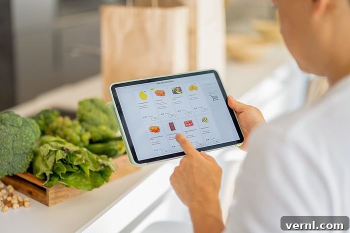 Man watching groceries in online store on digital tablet