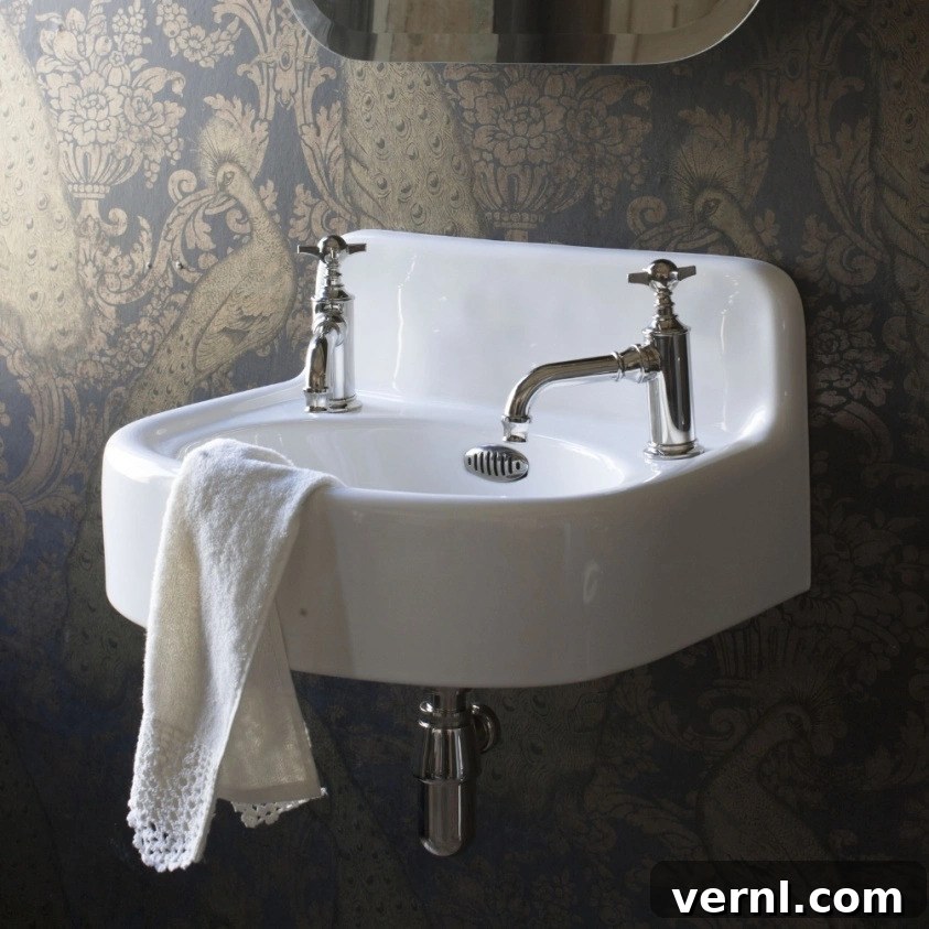 Best sinks for small bathrooms - an elegant wall hung cloakroom basin.